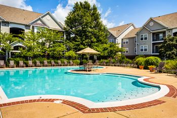 The preserve at ballantyne commons community swimming pool with apartment buildings